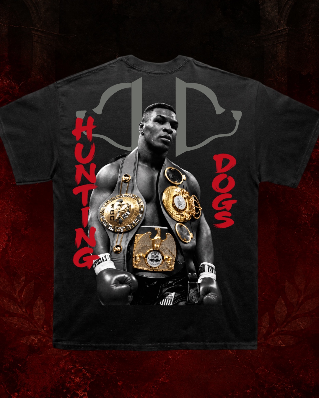 Iron Mike T-shirt back with a championship portrait, gold belts, and red Hunting Dogs lettering